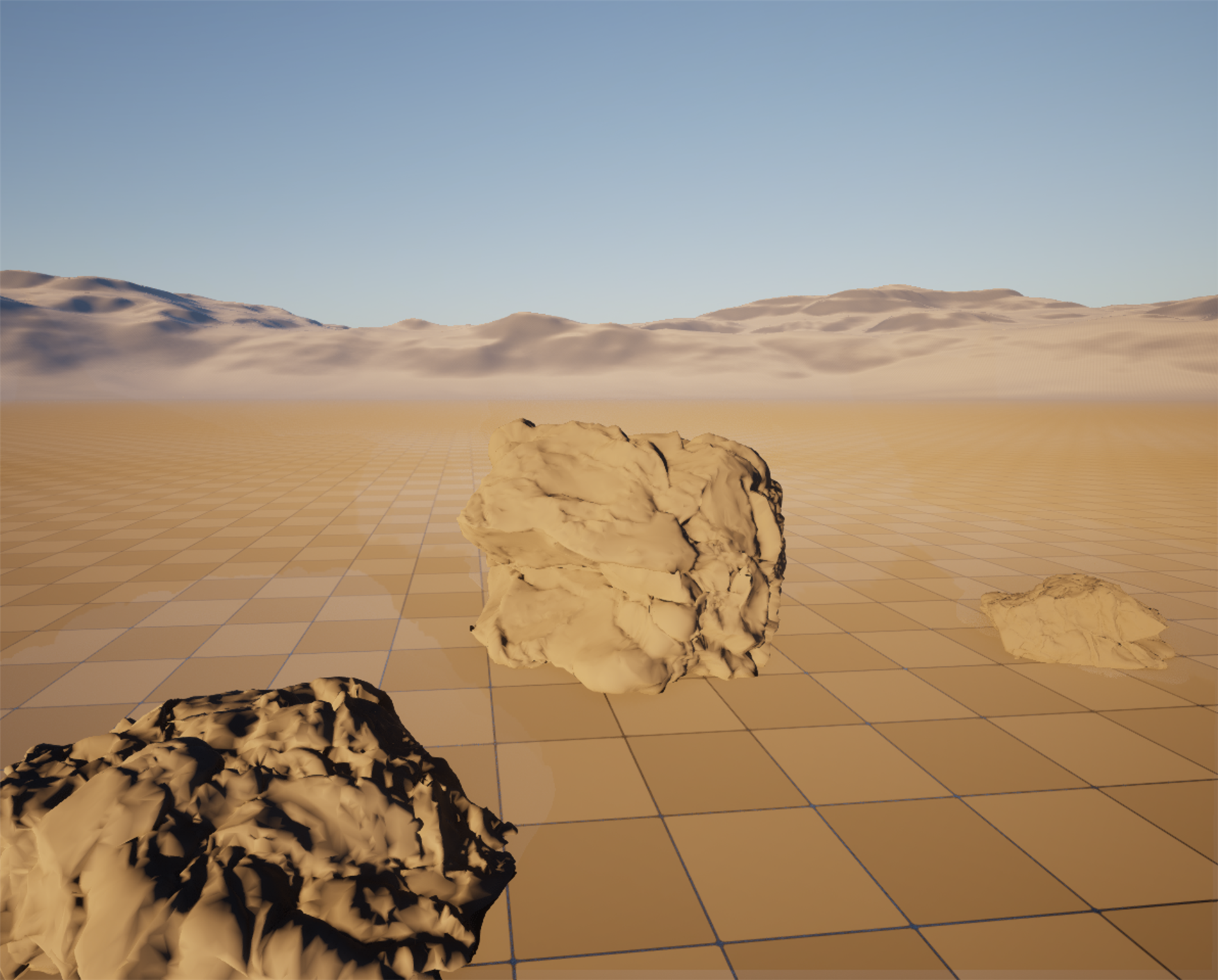 A real-time desert scene captured live in the course's Unreal project, showing an outcrop of Nanite-enabled rocks lit by Lumen. A large detailed boulder sits at center right with a deeply cracked and pitted surface catching warm sunlight, a second craggy rock fills the lower left in strong relief, and a smaller rock sits to the right. Behind them a warm sand basin hazes into a ring of dunes on the horizon under a clear graded sky. Every rock is a Static Mesh with Nanite enabled, drawn directly with no hand-authored level-of-detail chain.